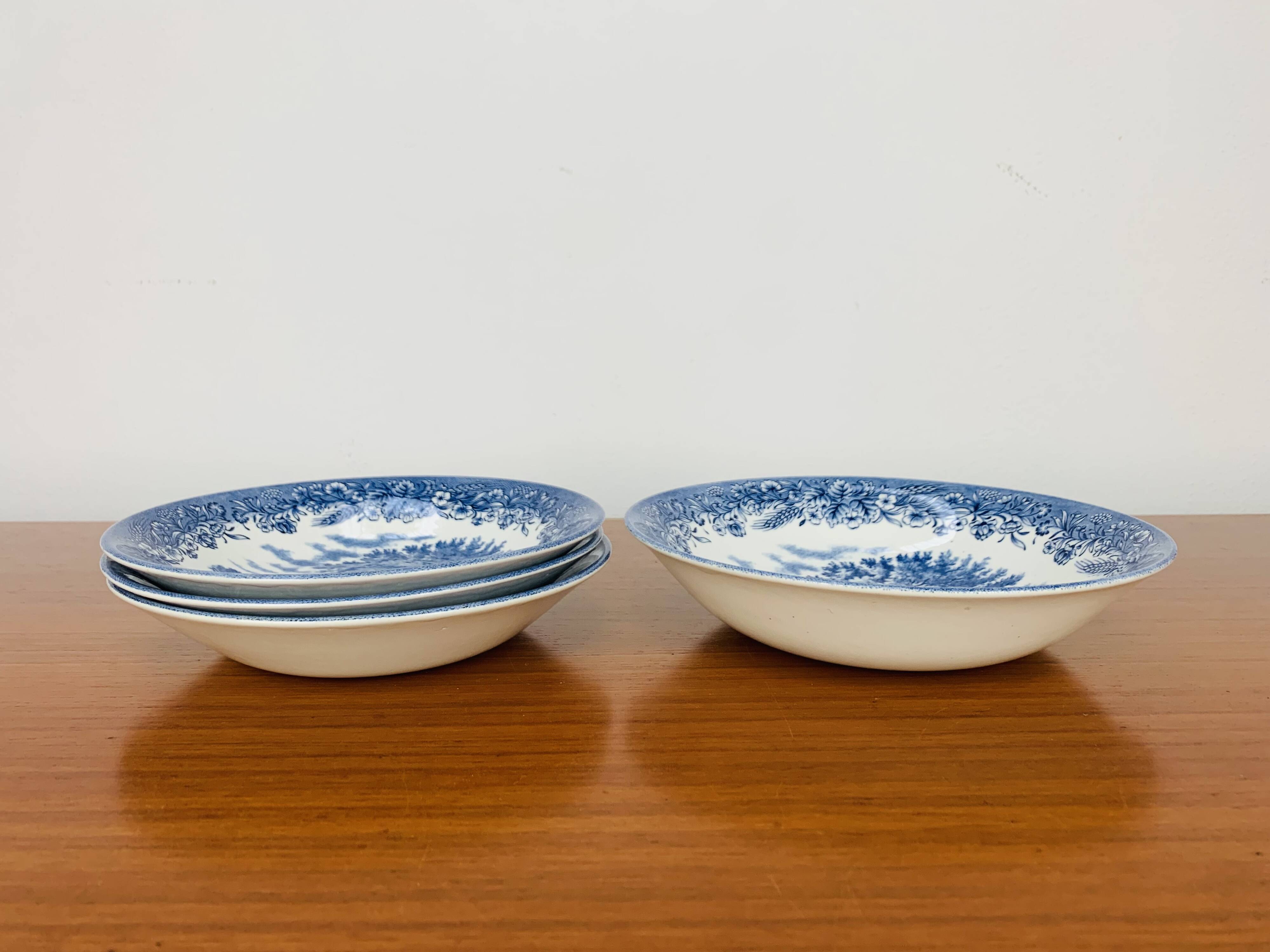 4 Churchill English ironstone soup plates, blue