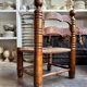 Low chair in dark wood and woven Danish cord attributed to Charles Dudouyt.