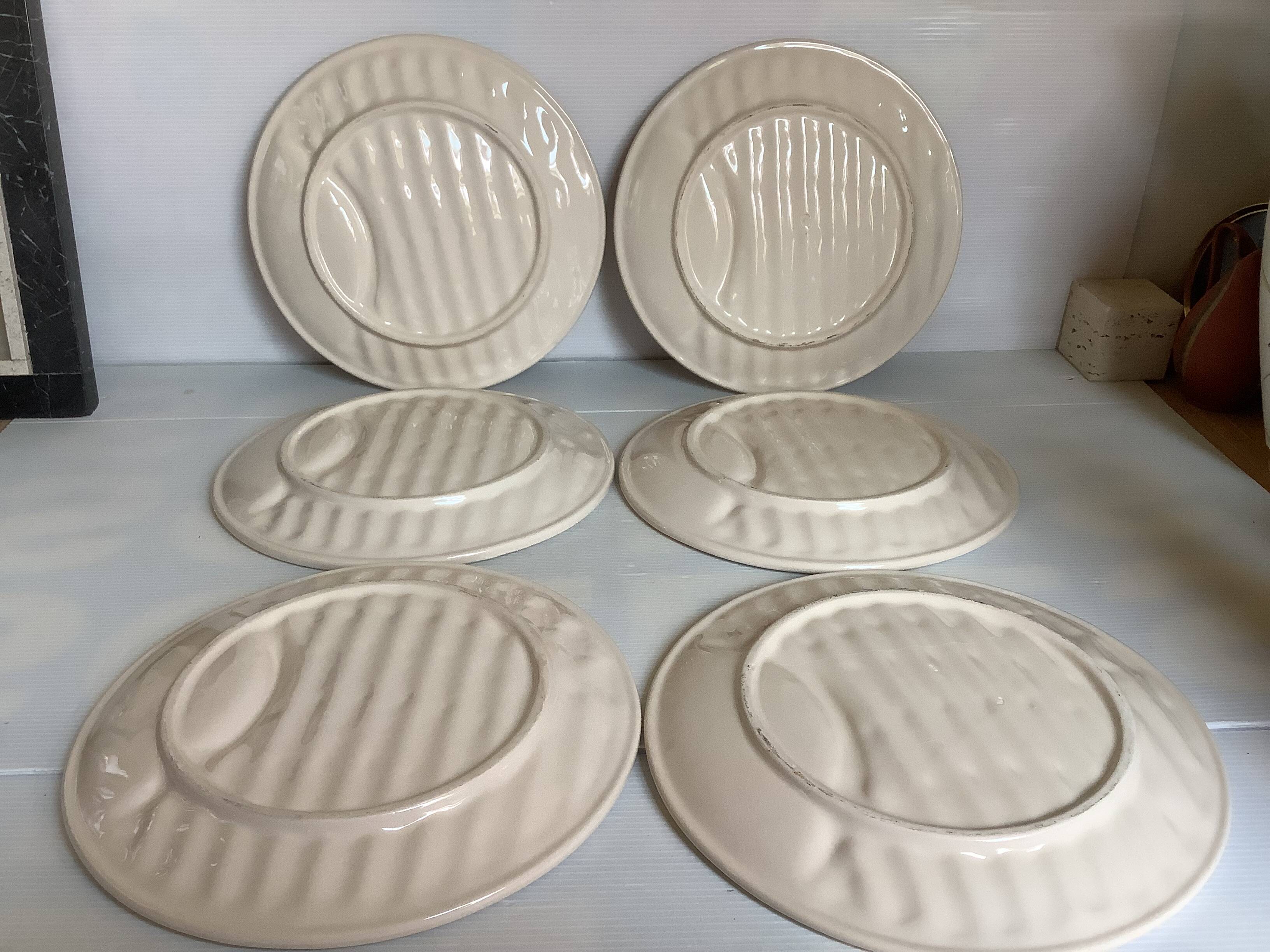 Six antique asparagus plates
