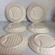 Six antique asparagus plates