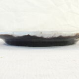 Plate cul noir 19 eme in faience of rouen de la metairie