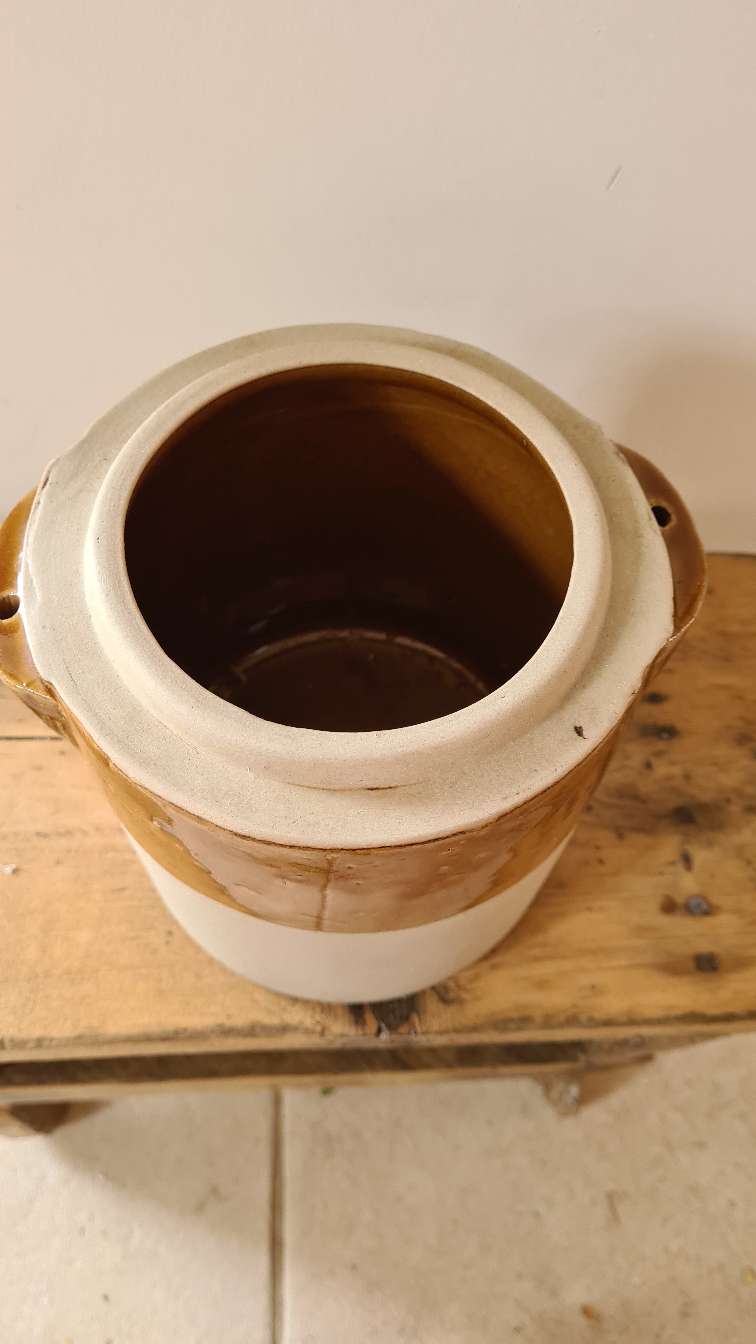 Old sandstone grease pot