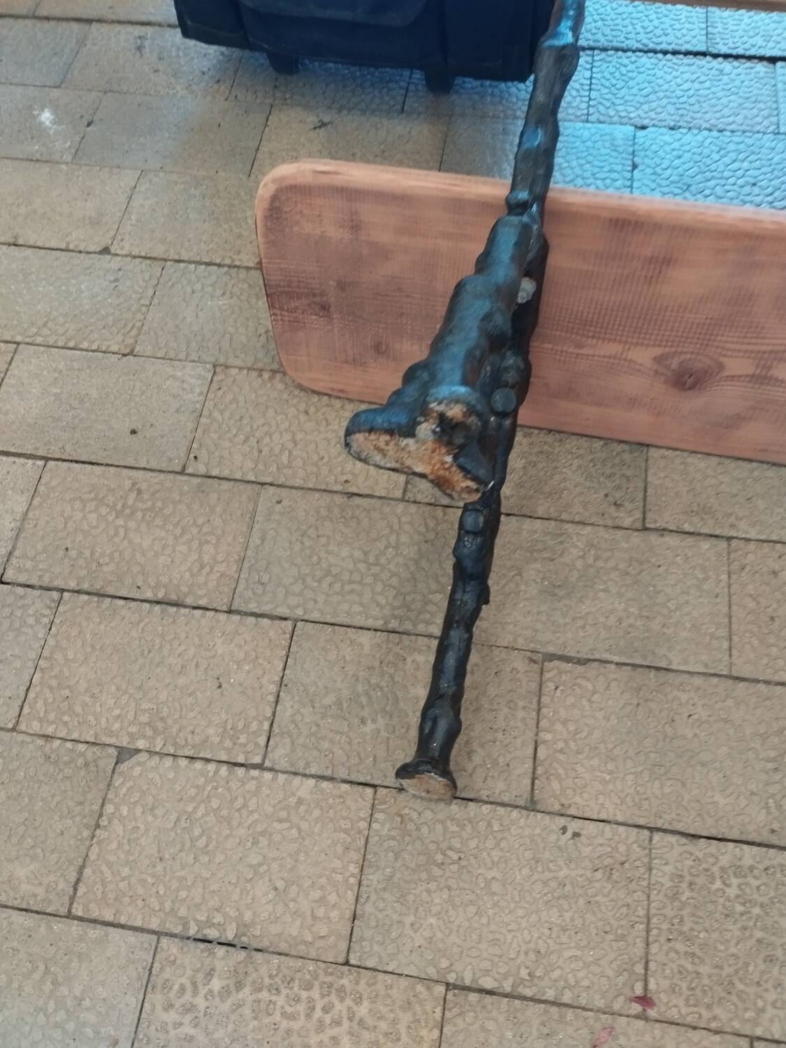 Antique garden bench with cast iron legs