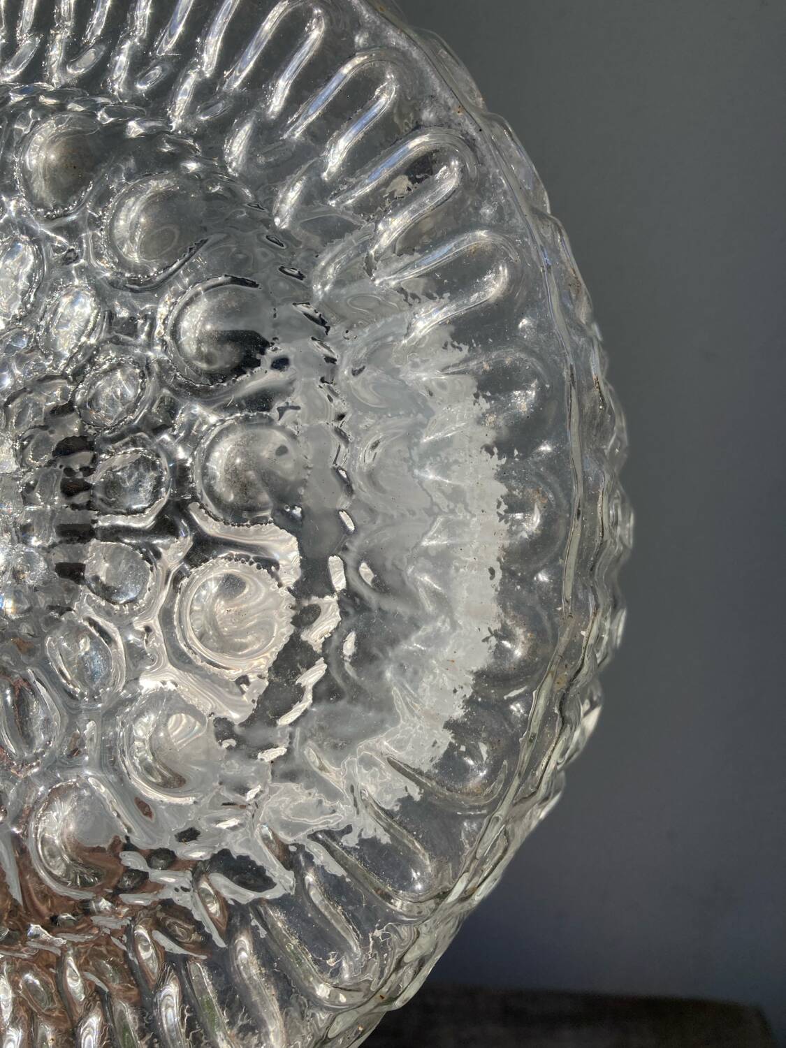 Pair of transparent round glass wall lights