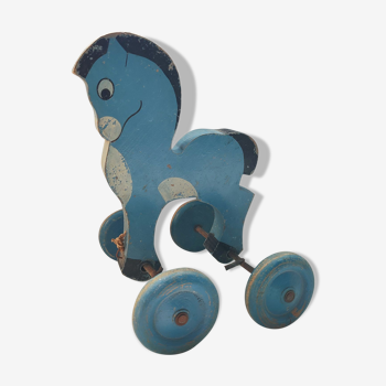 Cheval en bois sur roulettes décoration jouet à tirer