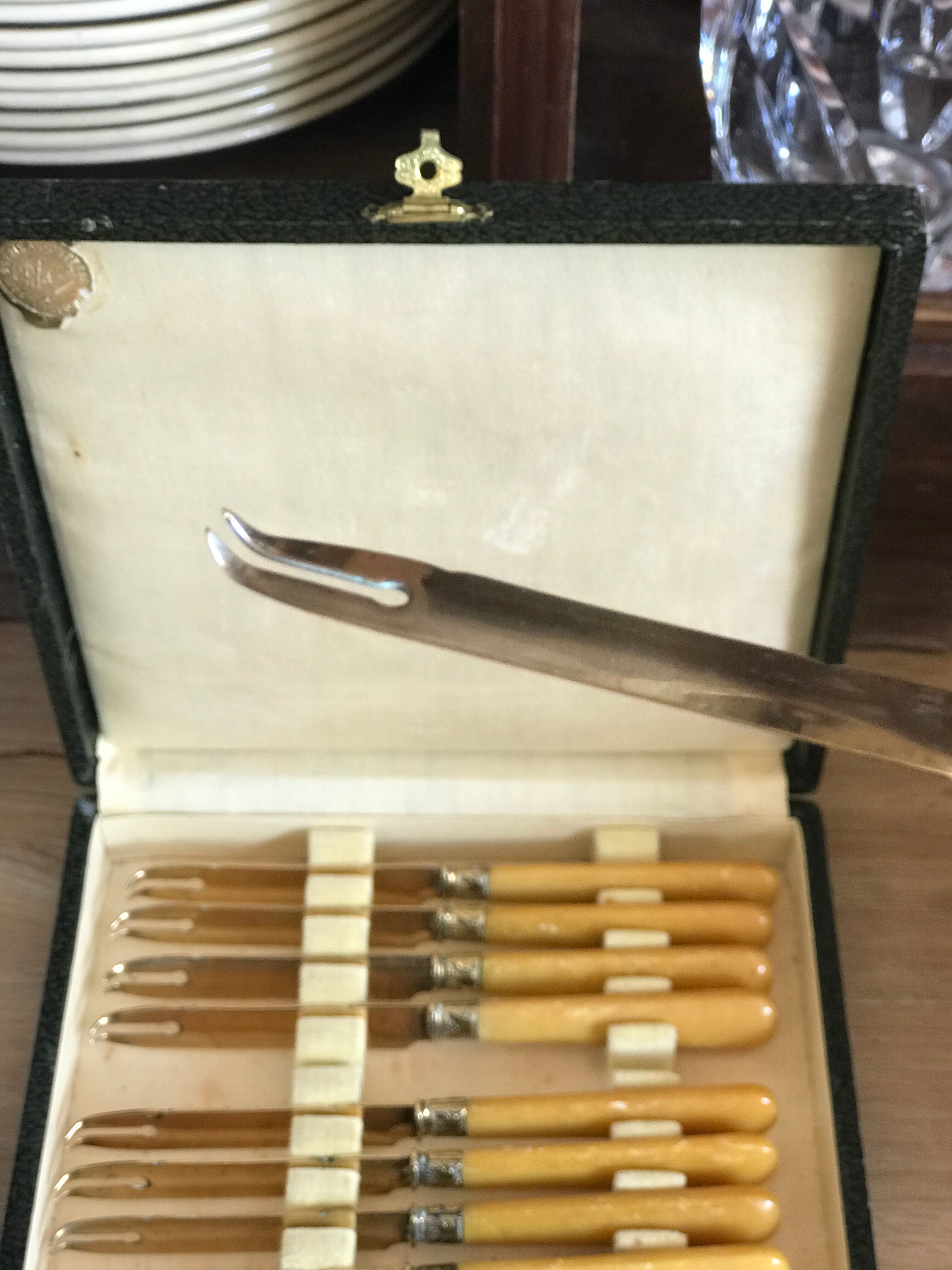 Antique cheese knives