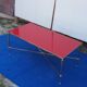 Brass coffee table with red glass top