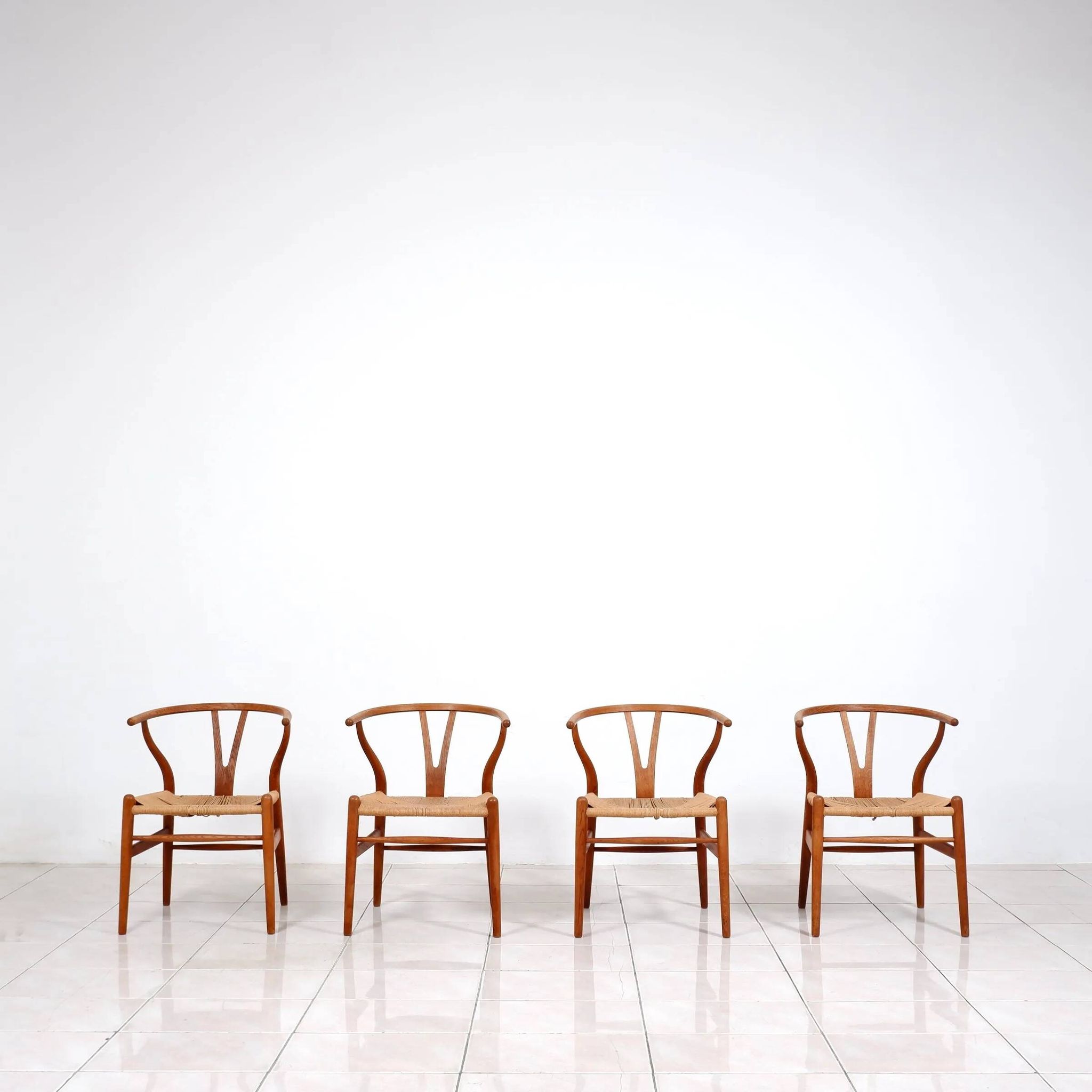 4 "CH24" Wishbone dining chairs by Hans J. Wegner for Carl Hansen & Son