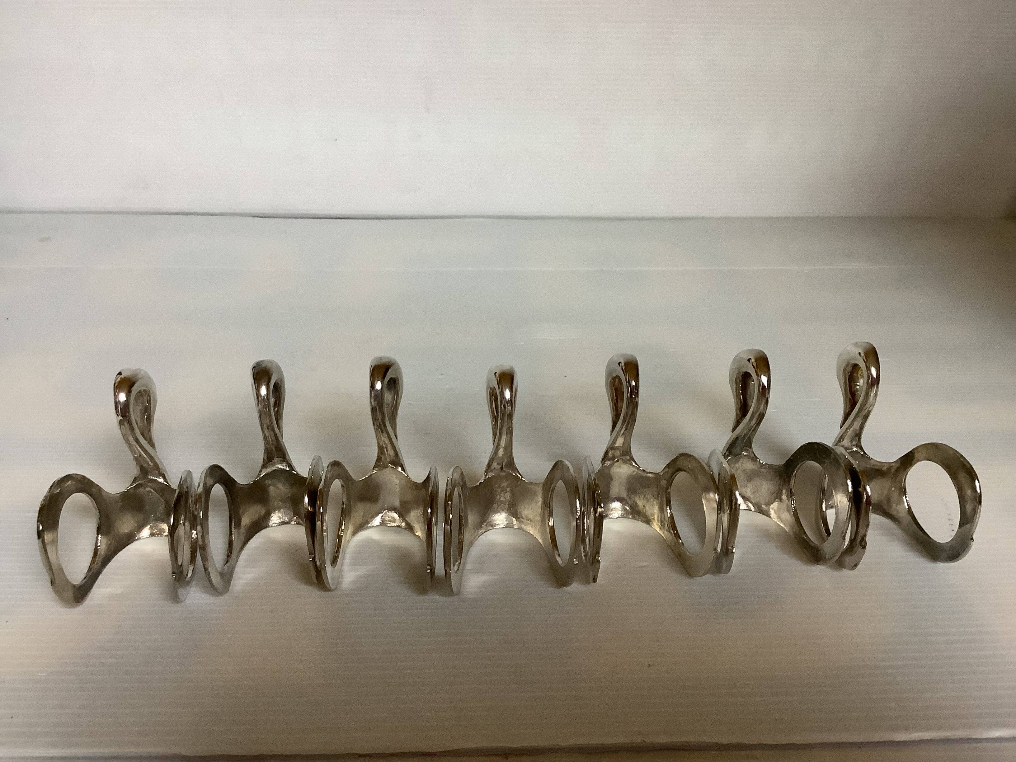 Seven silver-plated zoomorphic metal knife rests