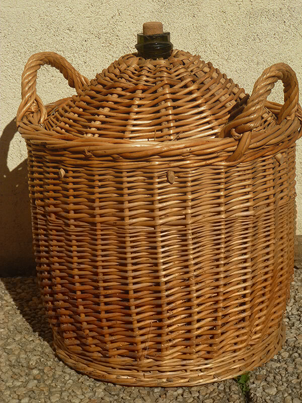 Demijohn covered with wicker