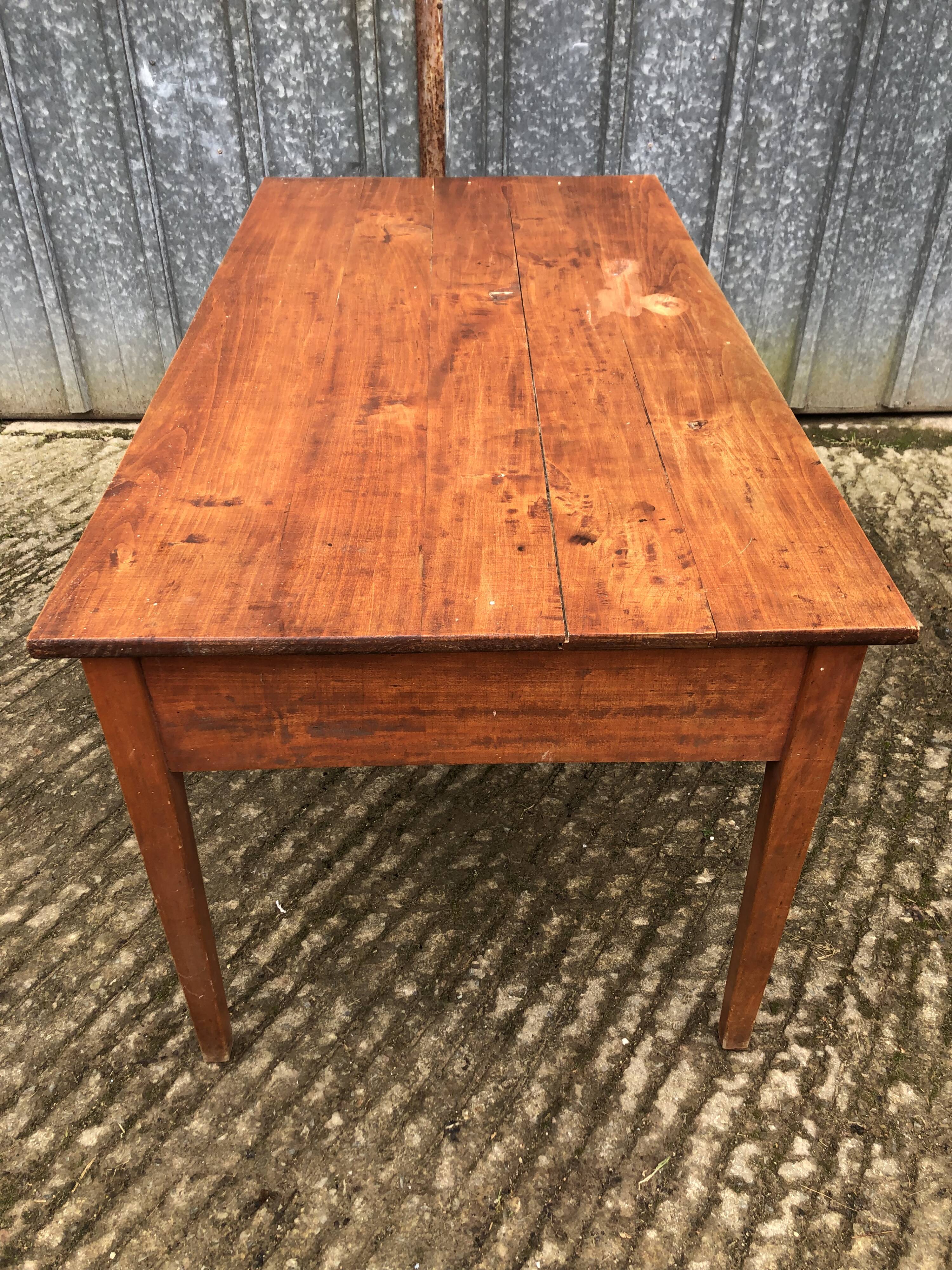 Poplar wood table with 2 front drawers from the Reconstruction period.