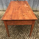 Poplar wood table with 2 front drawers from the Reconstruction period.