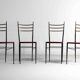Fine set of metal dining chairs with red leather seating, Italy 1970s