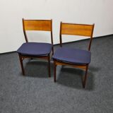 A pair of vintage teak dinning chairs