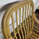 Fauteuil chauffeuse vintage en rotin des années 70