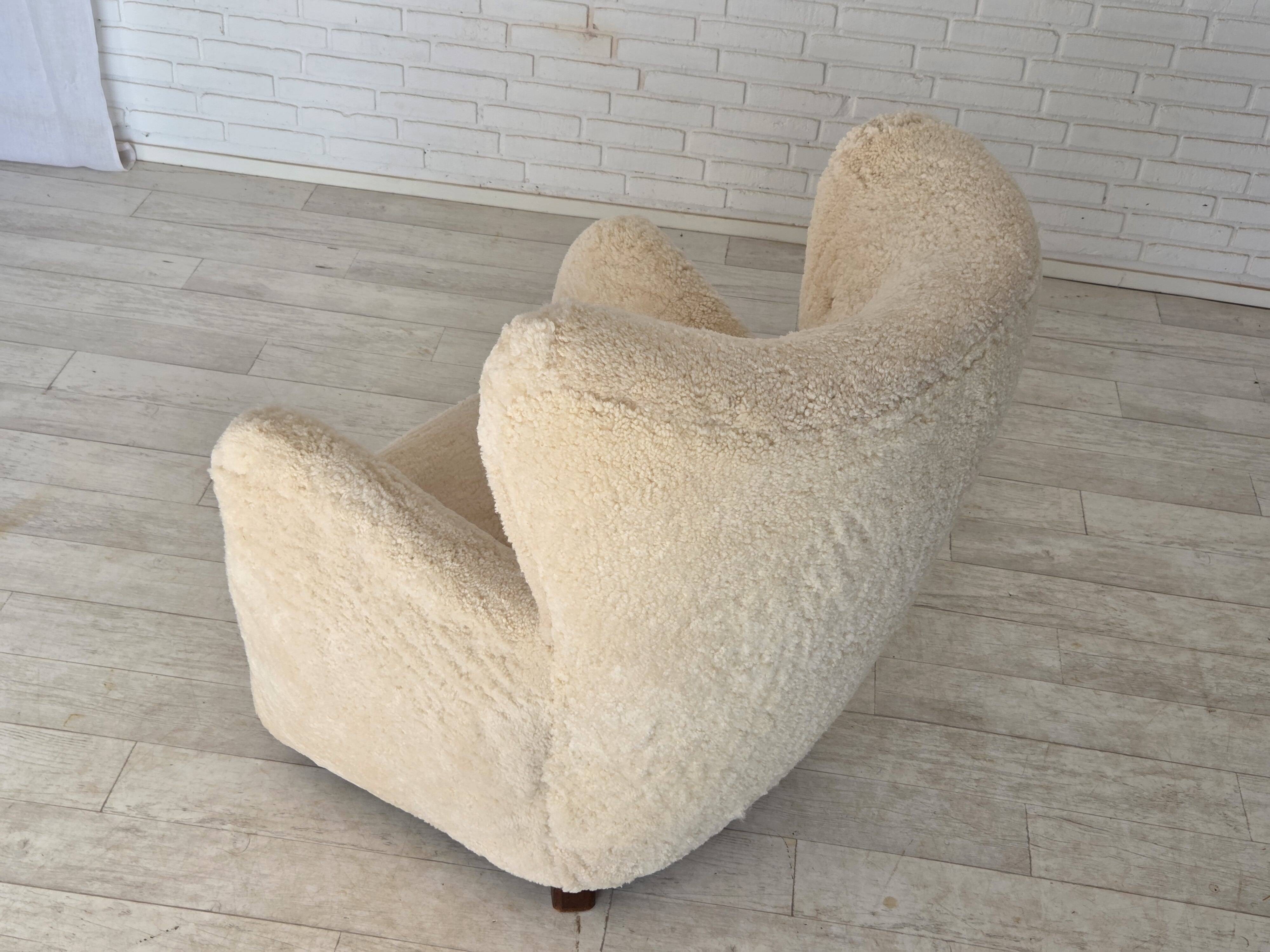 1960s, Danish armchair, genuine sheepskin "Canberra", reupholstered.
