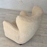 1960s, Danish armchair, genuine sheepskin "Canberra", reupholstered.