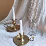 Large hand candlestick in gilded brass
