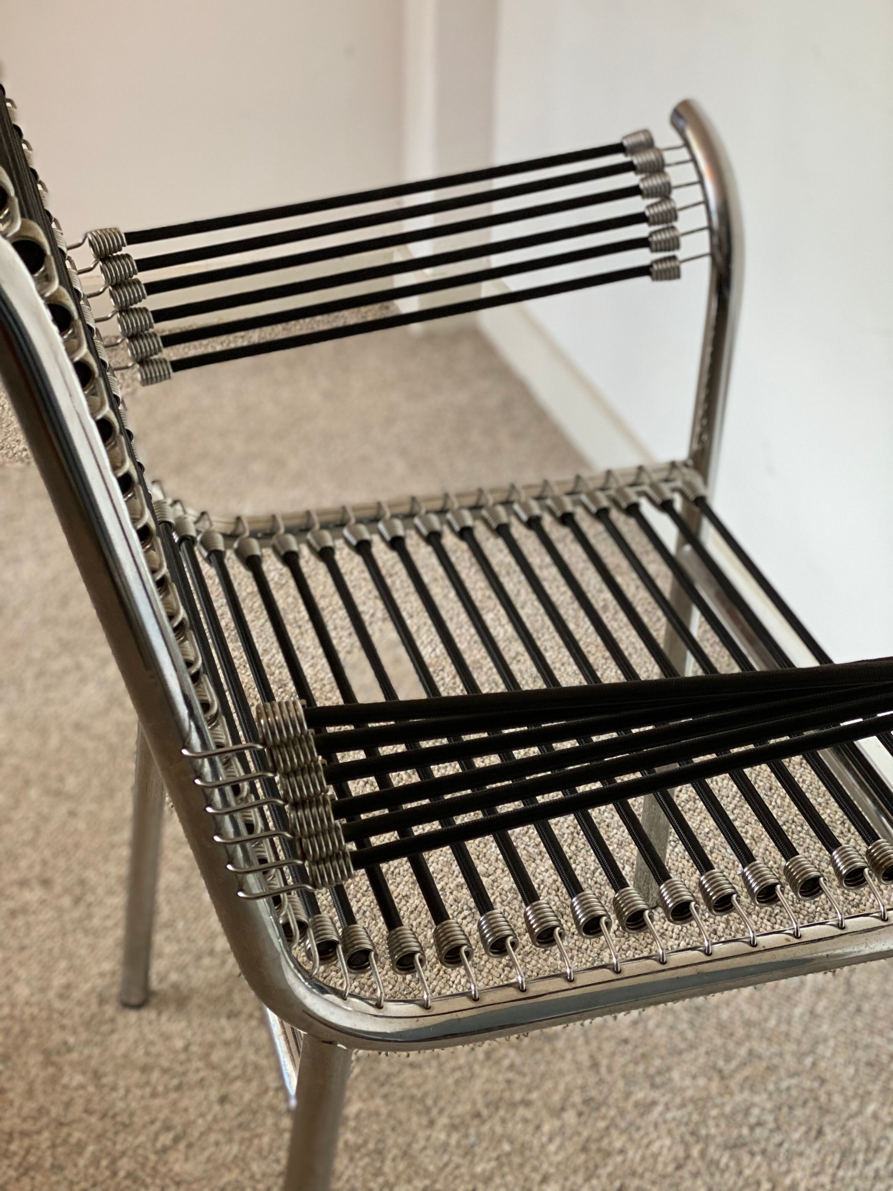 Set of 4 ‘bungee’ lounge chairs