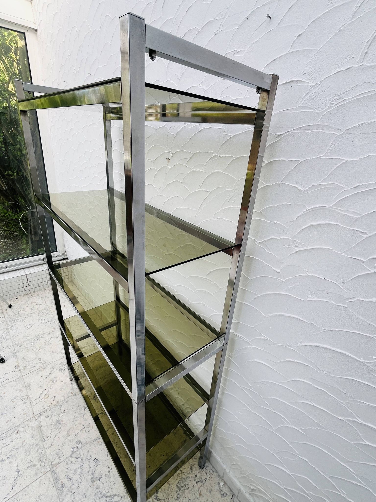 Vintage Italian design shelf in chrome and smoked glass from the 1970s.