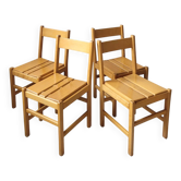 4 wooden chairs in the Charlotte Perriand style