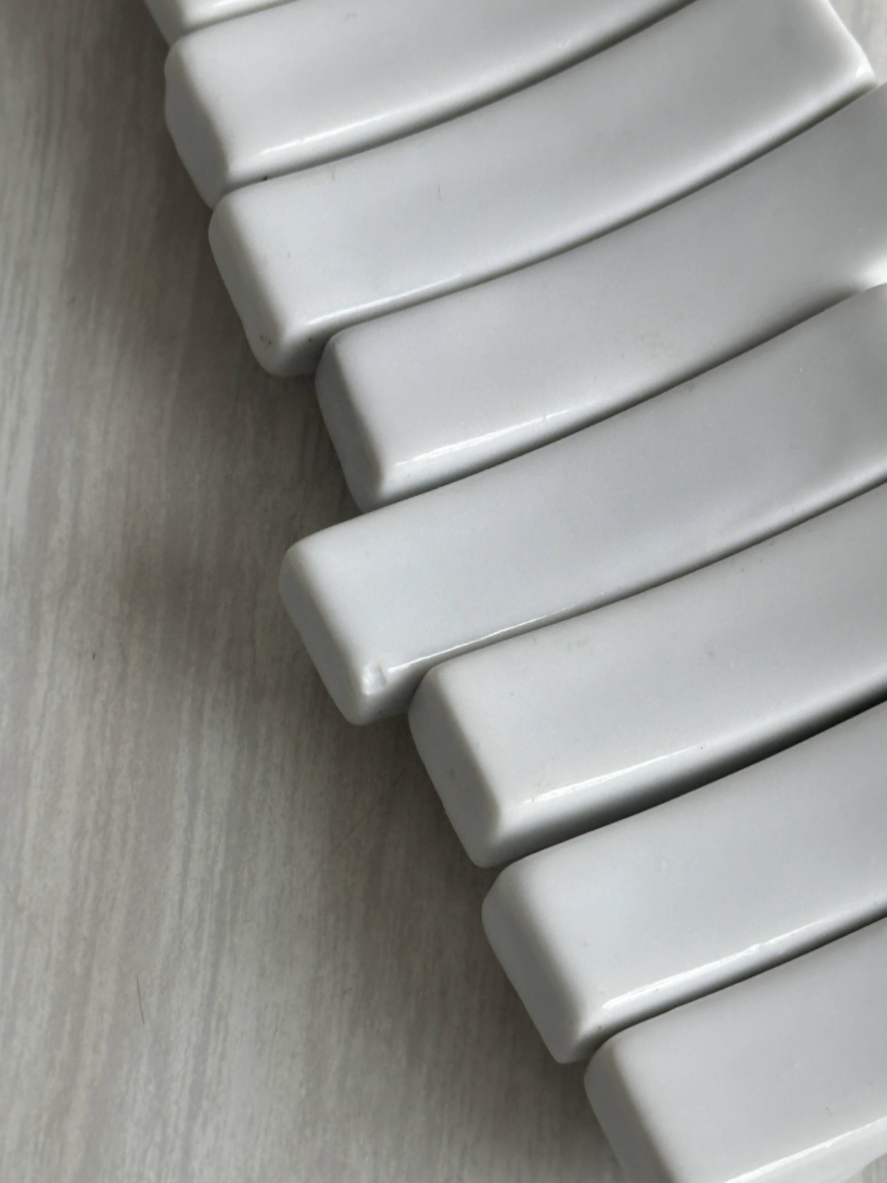 Set of white porcelain chopstick holders