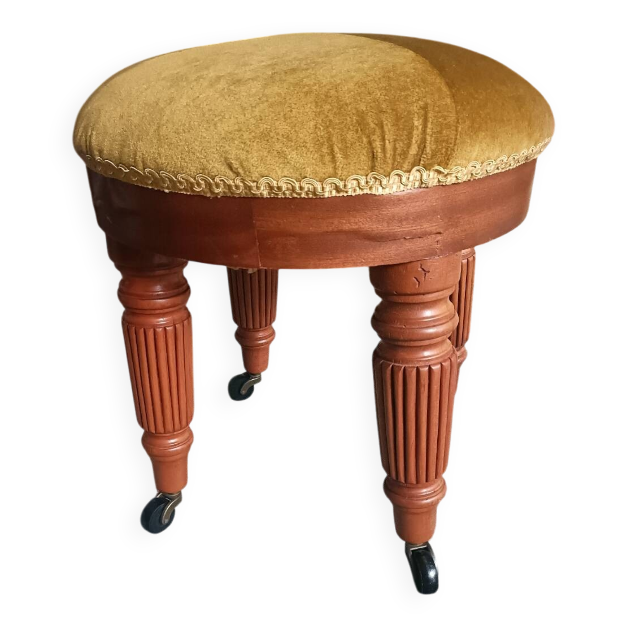 Upholstered stool on casters