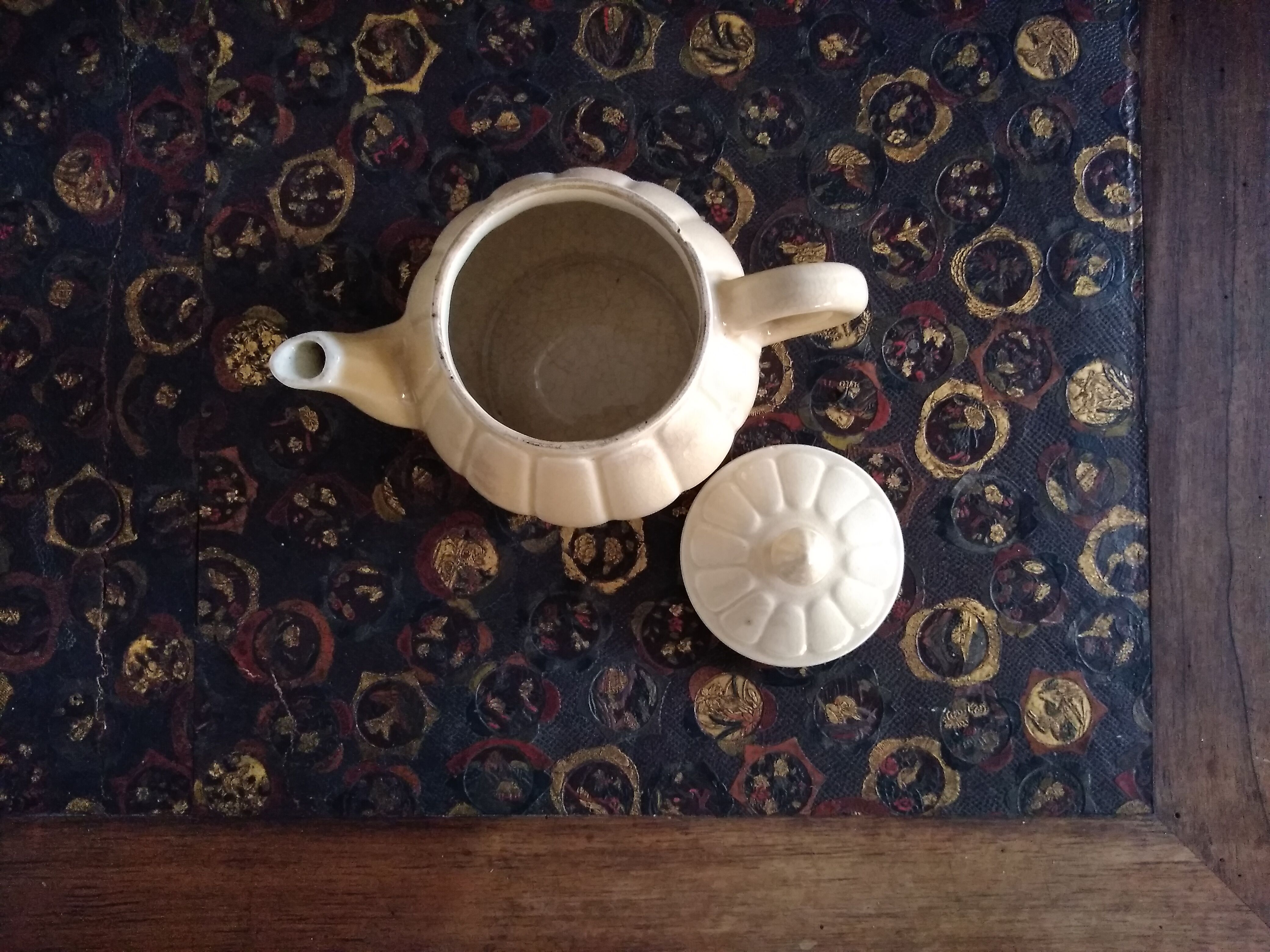 Cream-colored teapot