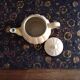 Cream-colored teapot