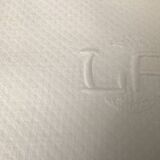 12 white damask napkins with LA monogram