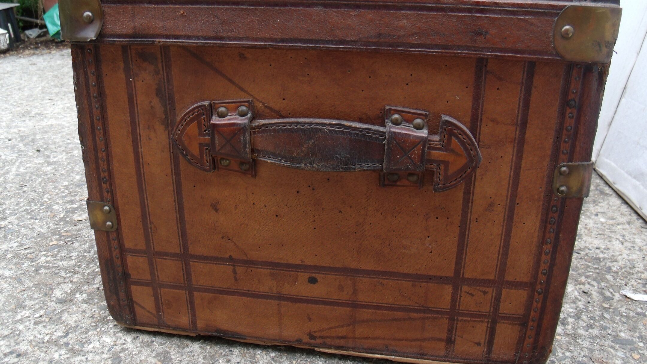 Old wooden trunk covered leather travel chest