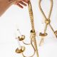 Pair of large gilded brass Noeud wall lights