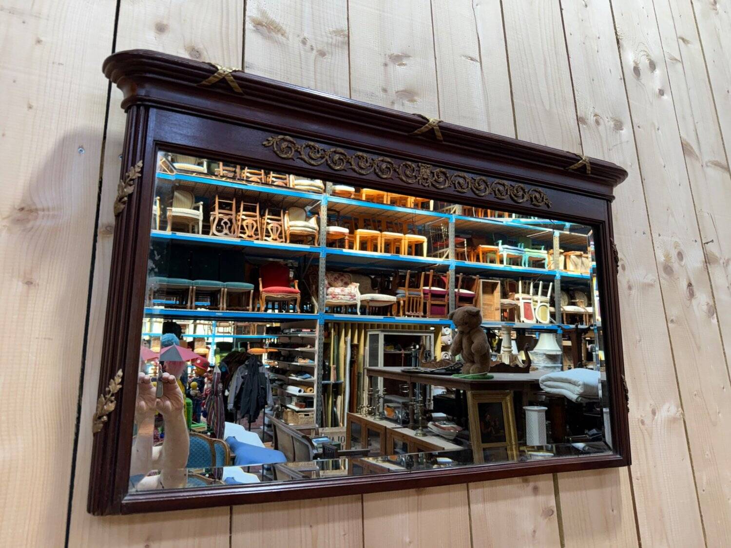 Louis XVI style mirror in mahogany and gold.