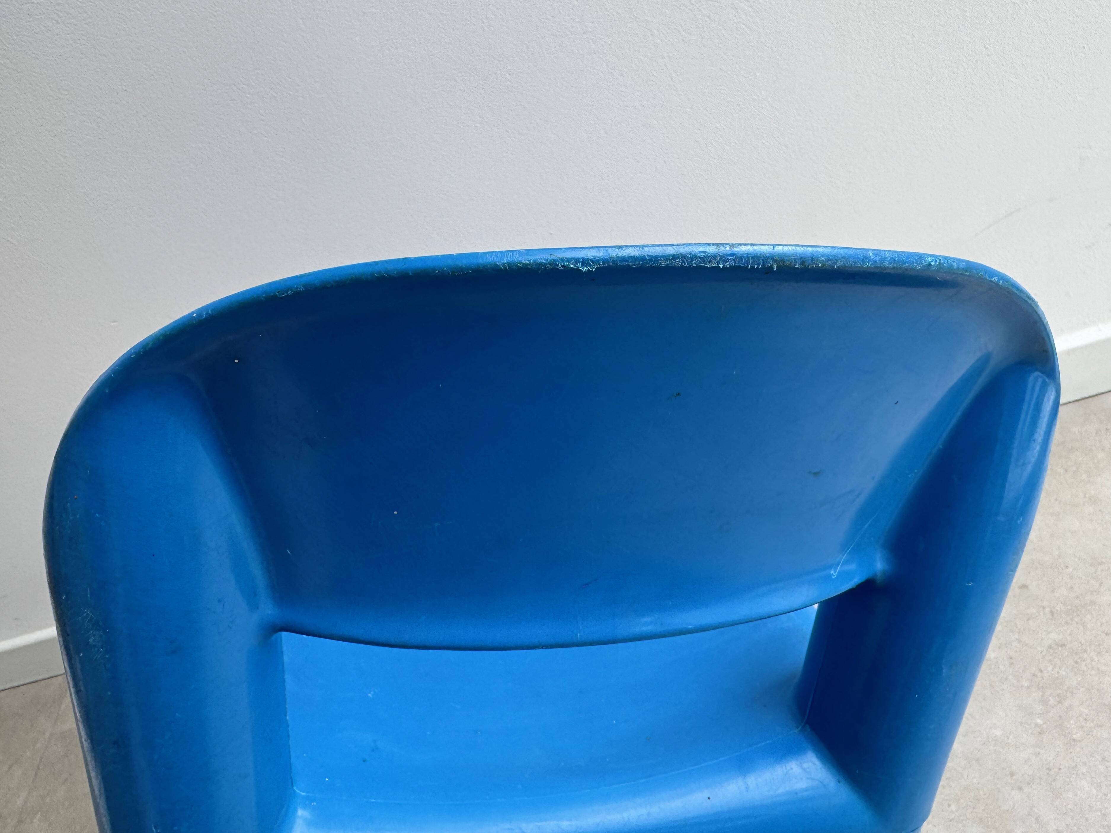 Blue plastic space age kids chair, bold italian design