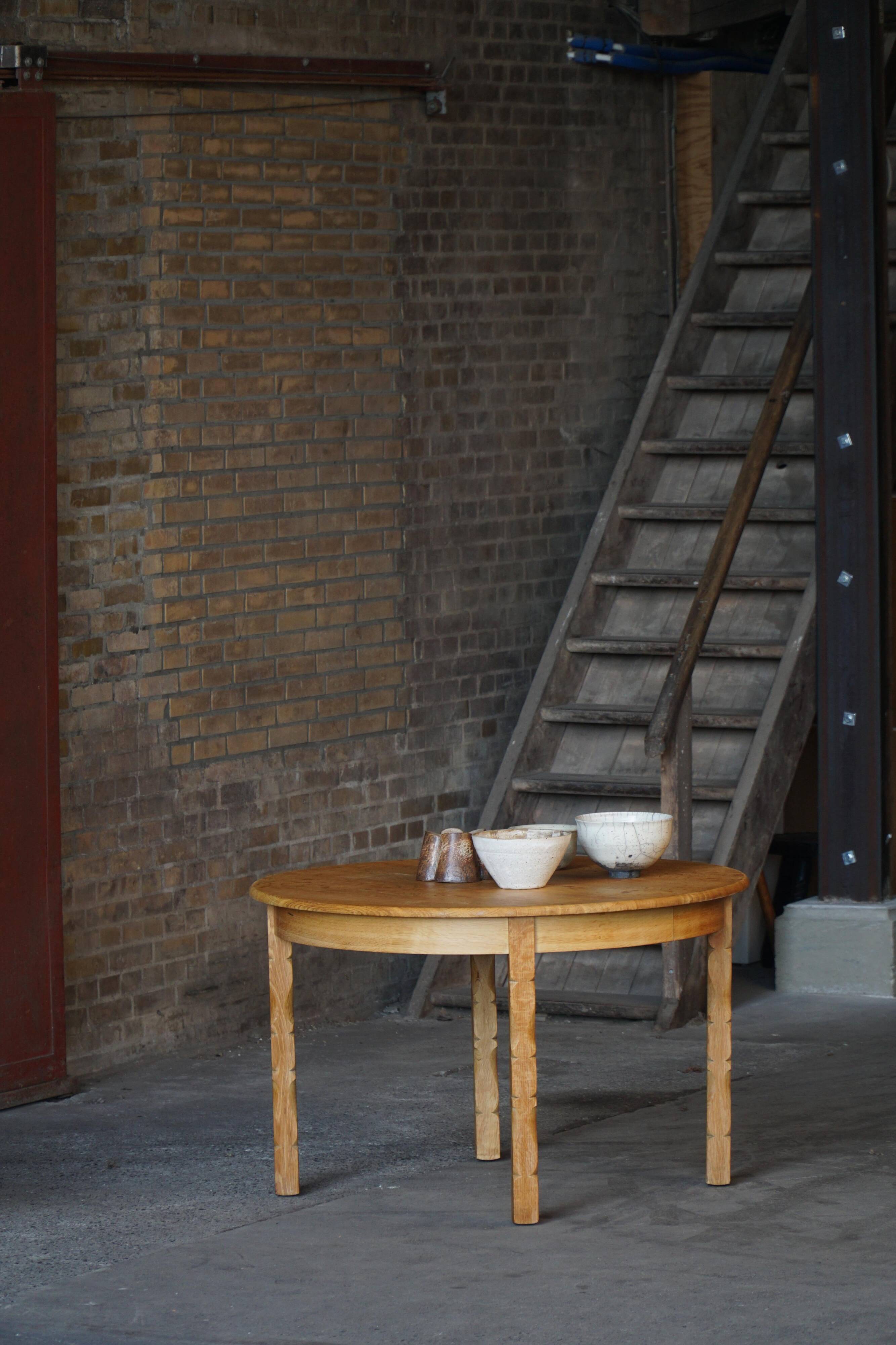 Mid-century round oak dining table with three extensions, Danish modern, 1960s.