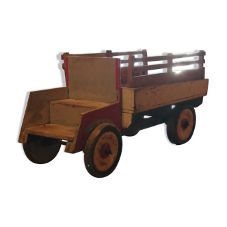 Old wooden toy. Large truckIn its patina.