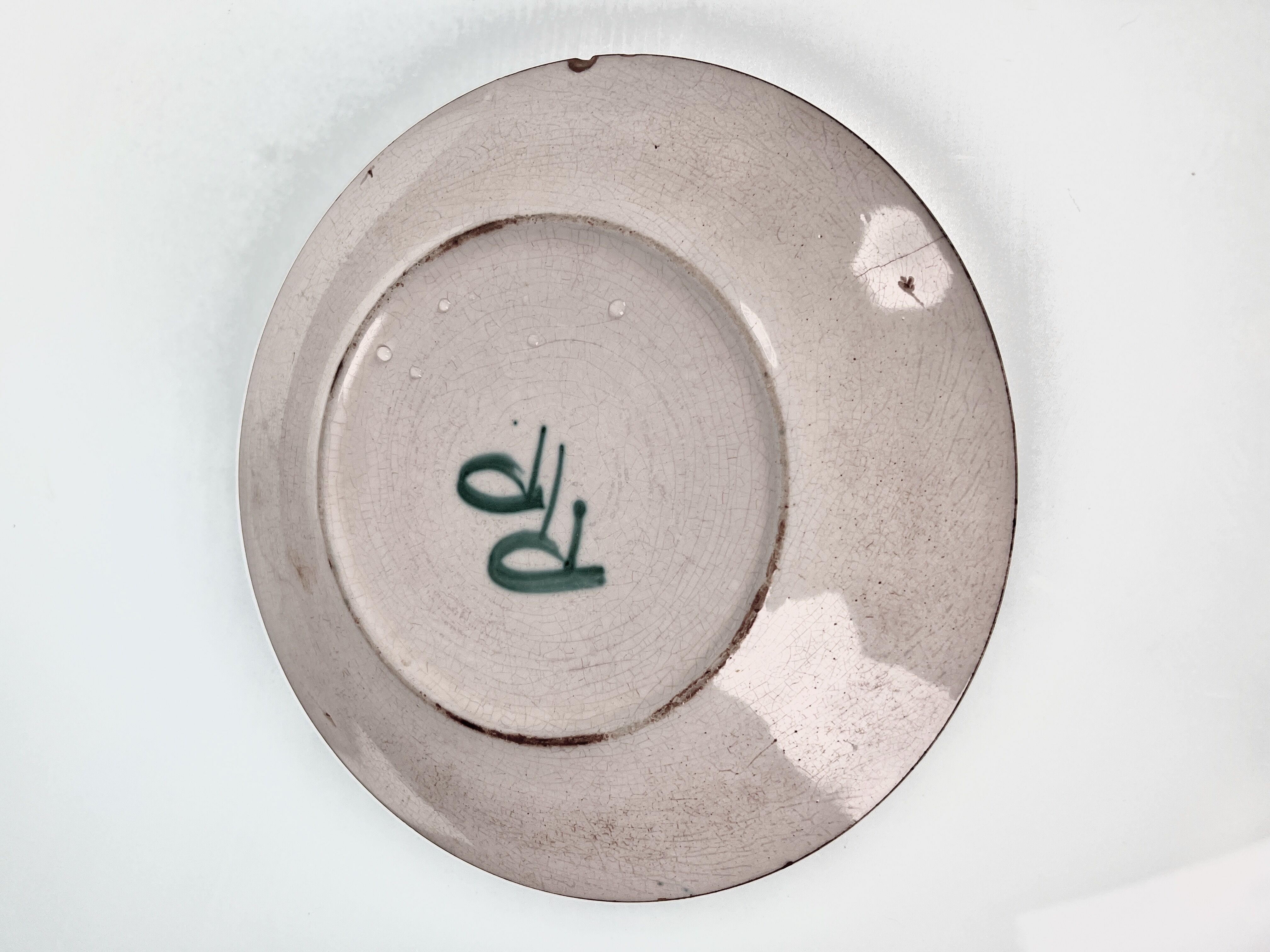 Flat ceramic plate by Robert Picault