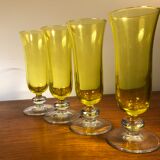 Large transparent yellow champagne flutes