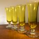 Large transparent yellow champagne flutes