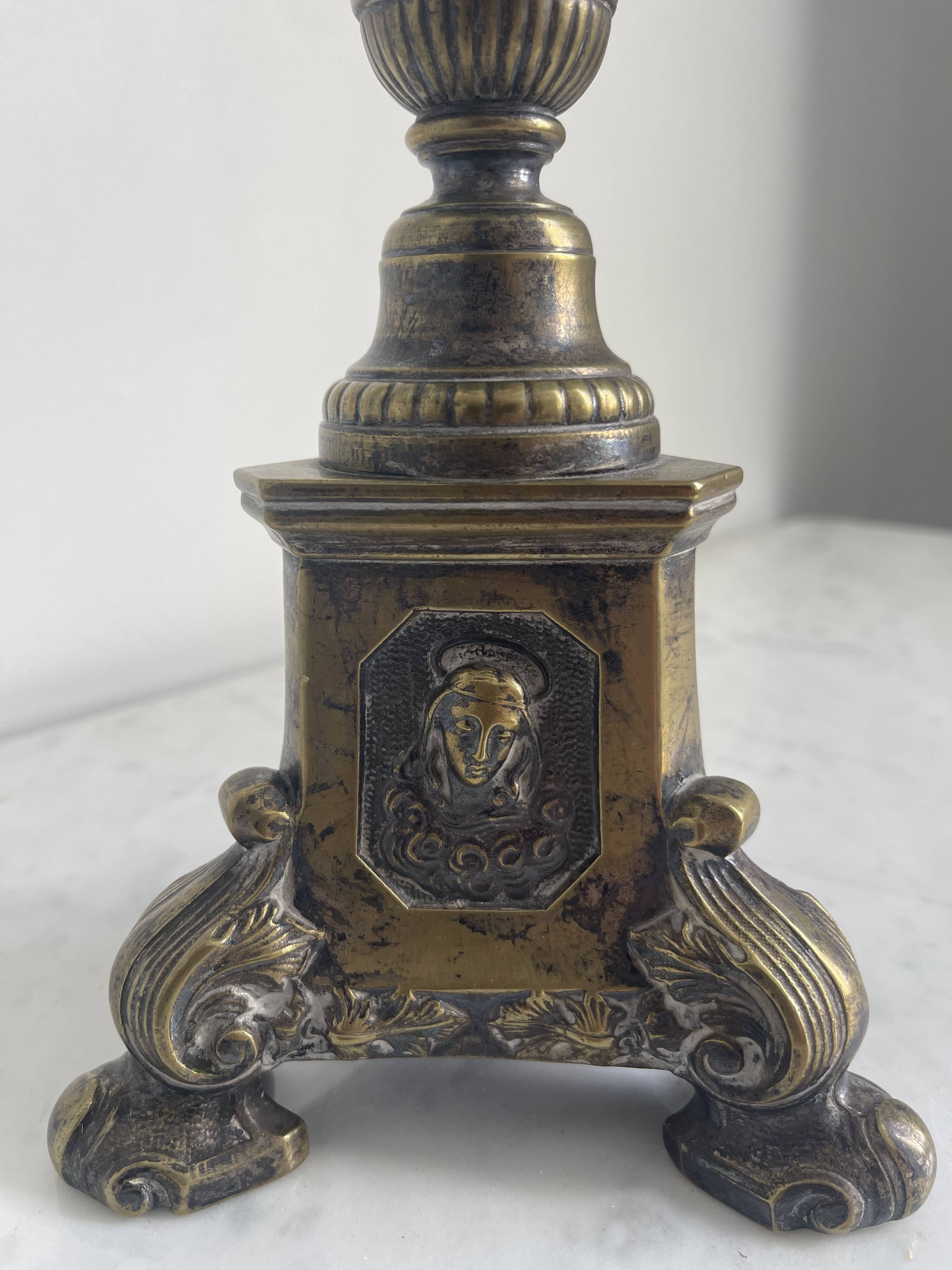 Old candle holder transformed into a lamp.