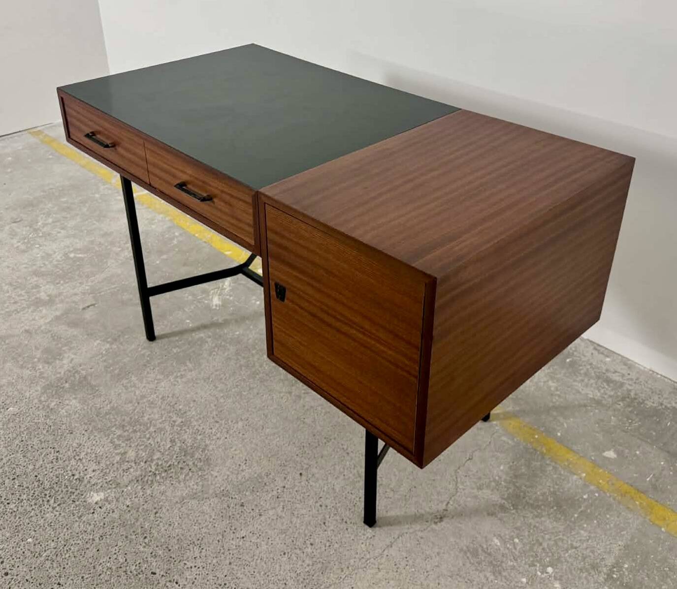 French modernist desk from the 1950s with 2 drawers, 1 cabinet, and 1 container.