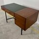 French modernist desk from the 1950s with 2 drawers, 1 cabinet, and 1 container.