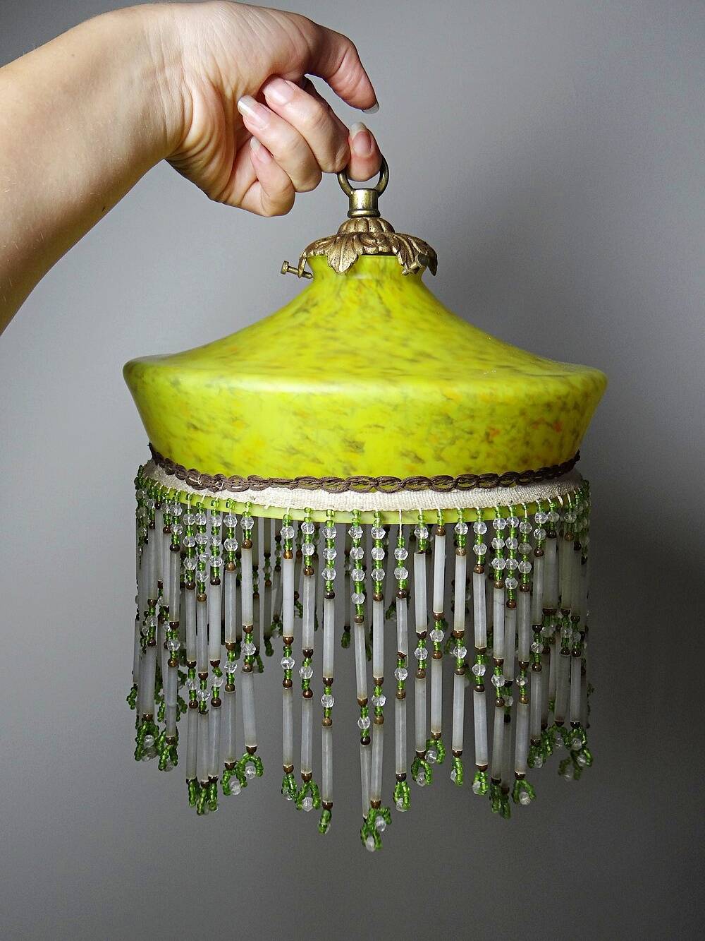 Antique Art Deco lampshade in yellow marbled glass with bead fringes.