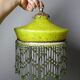 Antique Art Deco lampshade in yellow marbled glass with bead fringes.