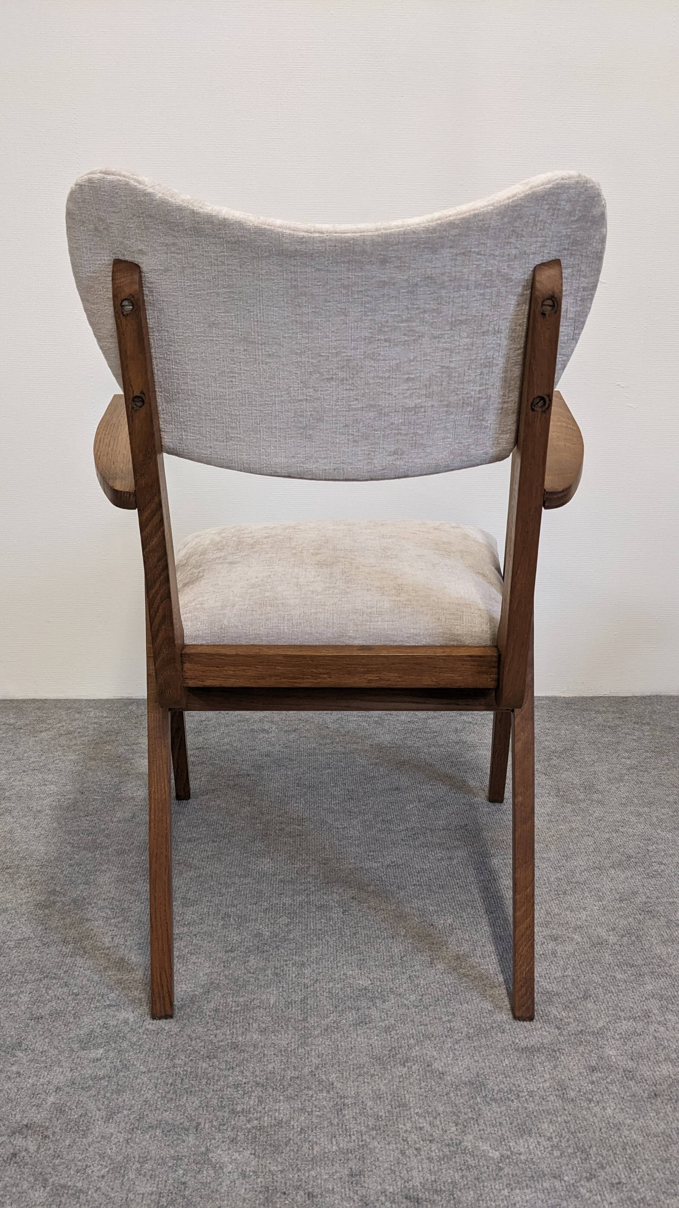 Pair of Scandinavian bridge armchairs in teak, Denmark circa 1950.