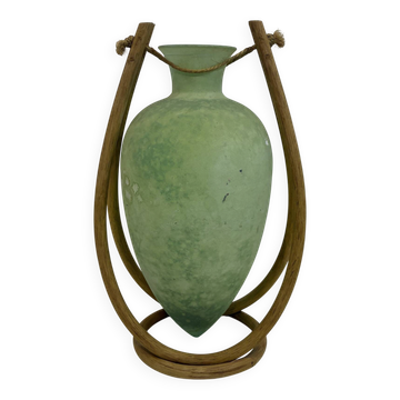 Rare glass paste amphora suspended in a wicker frame.