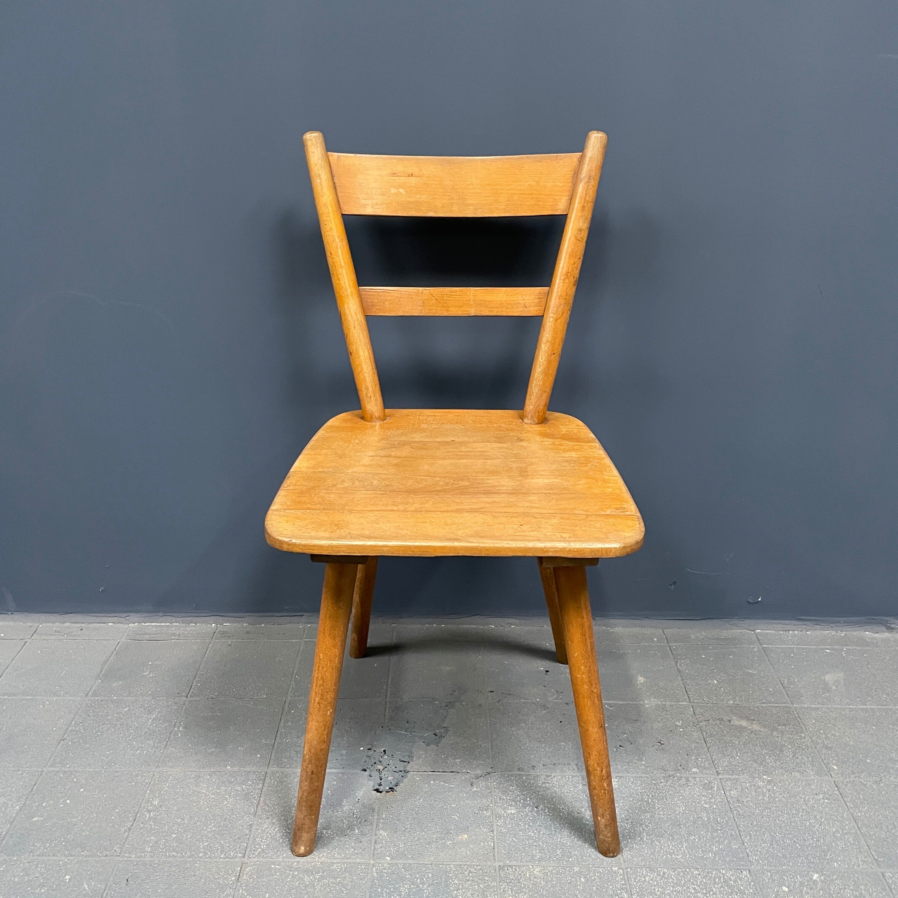 Set of eight german stick chairs from the 1950