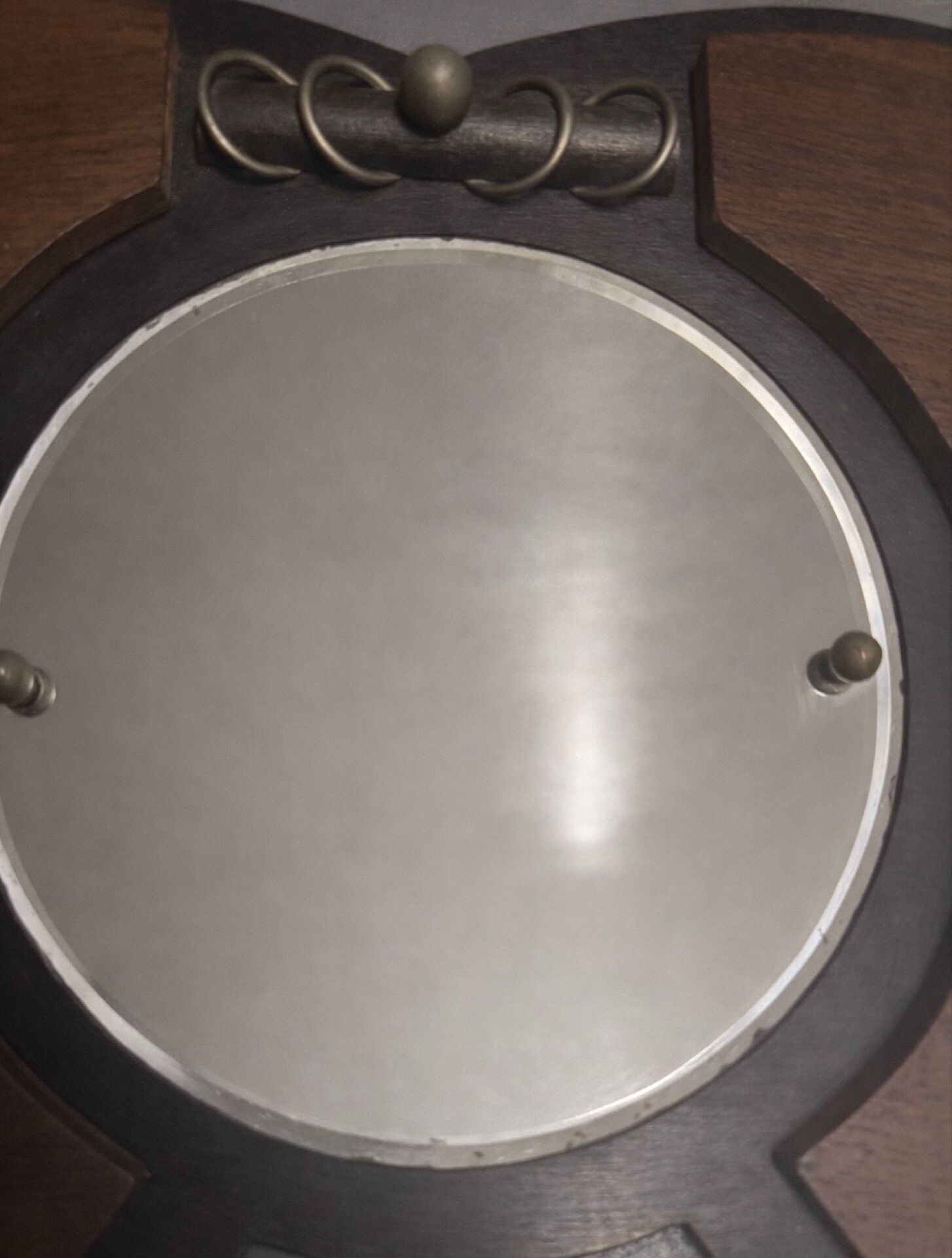 Art Deco mirror from the Amsterdam School, oak and brass set from the 1920s.