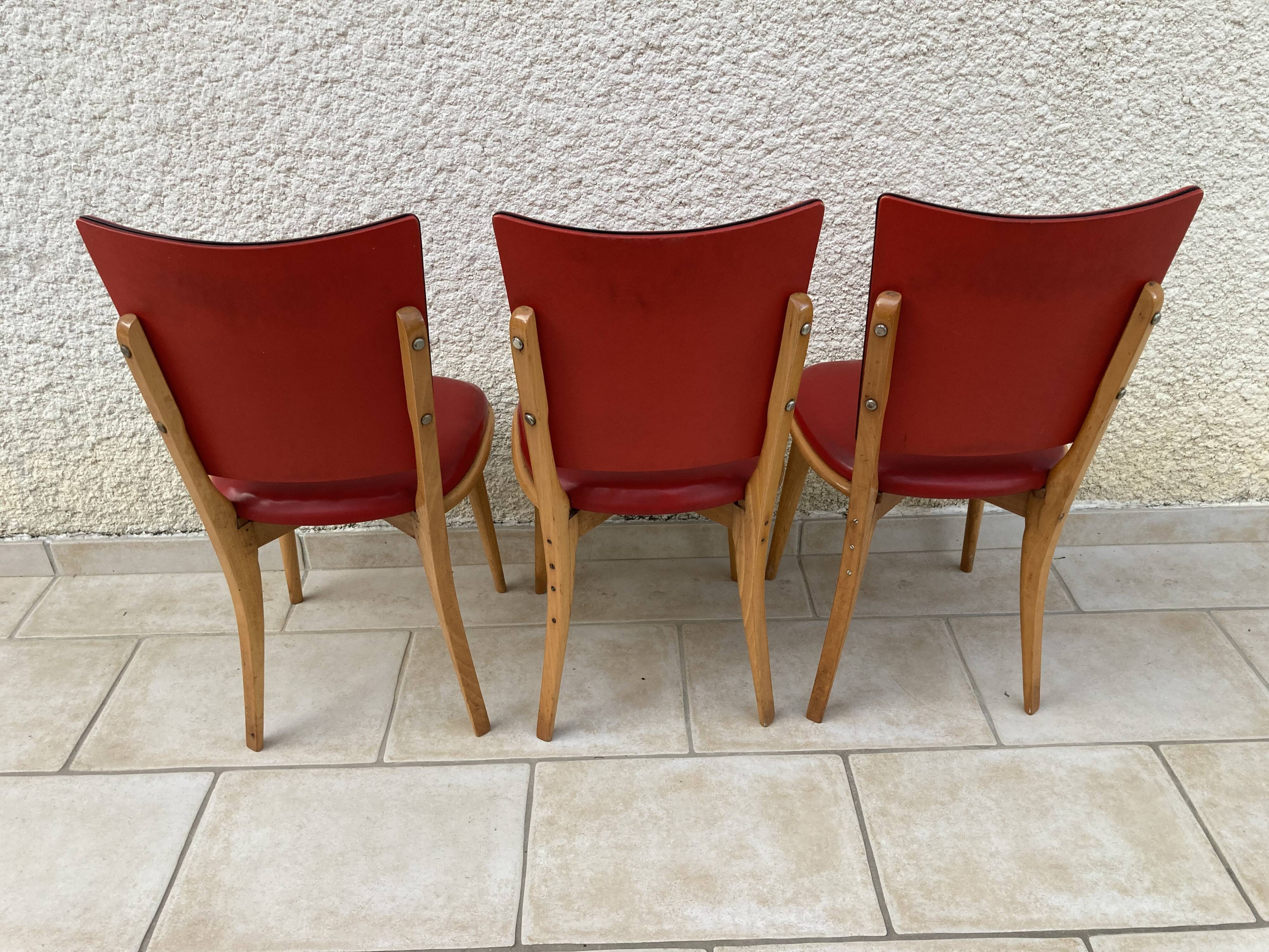 3 chairs in red Skaï