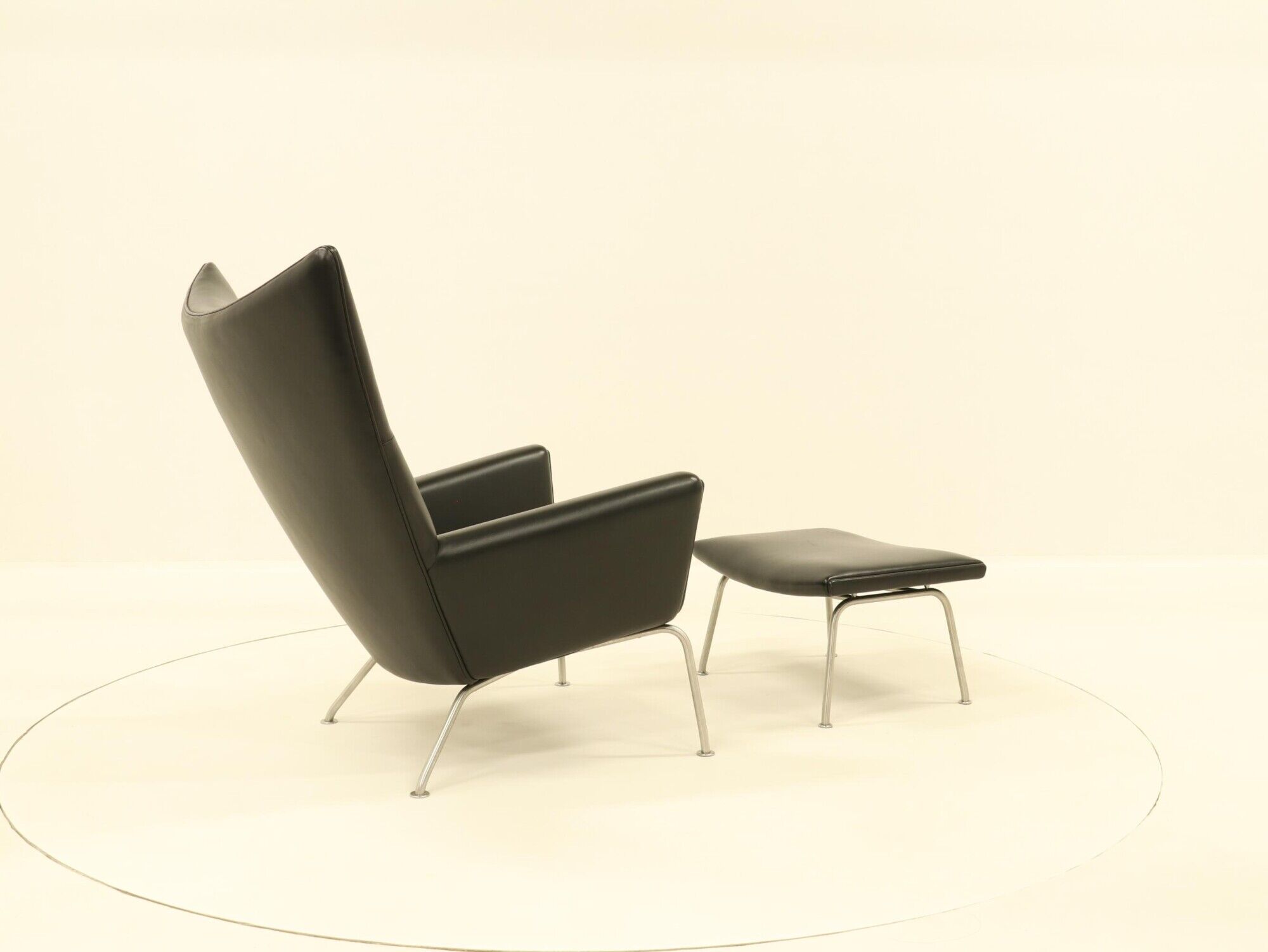 Wing chair & matching ottoman – CH445 & CH446 – by Hans Wegner